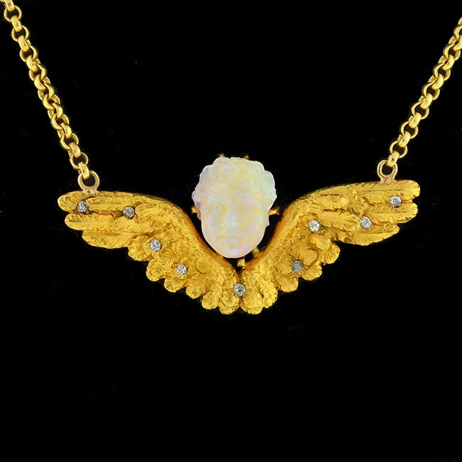 women moonstone necklaces -Victorian 18kt Carved Opal & Diamond Winged Cherub Necklace