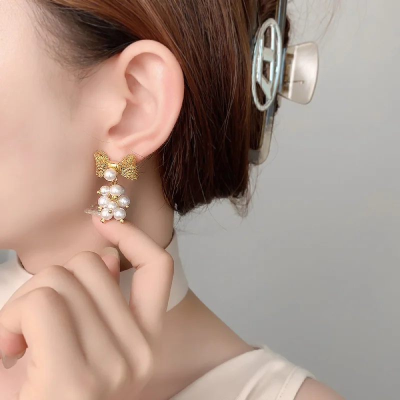 women shimmering earrings -Ribbon Bow Grapes Styled Gold Pin Earrings JLT12868