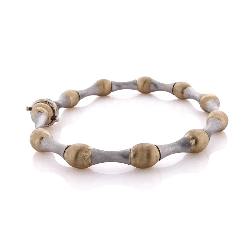 women stacking bangles -Estate 14 Karat Two-Tone Alternating Brushed Gold Balls and Bars Bracelet